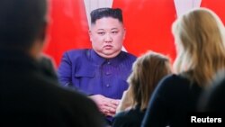 Members of the media watch a broadcast of the meeting between North Korean leader Kim Jong Un and Russia's President Vladimir Putin (not pictured) at the Far Eastern Federal University campus at Russky Island in Vladivostok, Russia, April 25, 2019.