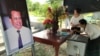 A woman paid her respect to slain political analyst Kem Ley on the third anniversary of his death at his home in Leay Bor commune in Takeo province's Tram Kam district, Cambodia, July 7, 2019. (Hul Reaksmey/VOA Khmer) 