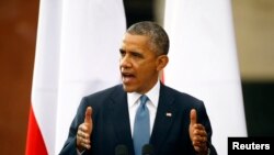 U.S. President Barack Obama addresses during a ceremony marking the "Freedom Day" anniversary in Warsaw's Castle Square June 4, 2014. 