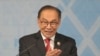 FILE - Malaysian Prime Minister Anwar Ibrahim delivers his speech during the closing ceremony of the Association of Southeast Asian Nations (ASEAN) Summit in Vientiane, Laos, Oct. 11, 2024.