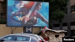 An advertisement of "Wonder Woman" movie is pictured near an army post in Beirut, Lebanon, May 31, 2017.