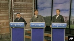 Three candidates for prime minister of the Tibetan government-in-exile in Northern India - Tenzin Tethong (l), Lobsang Sangay (c) and Tashi Wangdi (r) - face off in Washington for an internationally-televised debate, March 1, 2011