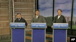 Three candidates for prime minister of the Tibetan government-in-exile in Northern India - Tenzin Tethong (l), Lobsang Sangay (c) and Tashi Wangdi (r) - face off in Washington for an internationally-televised debate, March 1, 2011