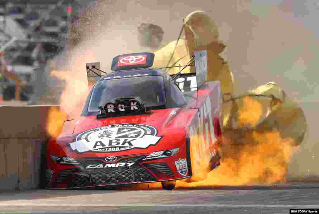 NHRA car driver Alexis DeJoria suffers an engine fire after winning her first round matchup during the Fall Nationals at Texas Motorplex in Ennis, Oct. 18, 2020. DeJoria was uninjured in the fiery incident. (Credit: Mark J. Rebilas-USA TODAY Sports)