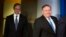 El Secretario de Estado, Mike Pompeo, a la derecha, seguido de Brian Hook, el representante especial para Iran, caminan hacia una rueda de prensa en el Departamento de Estado. 