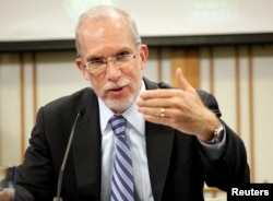 FILE - Evans Revere, former U.S. deputy ambassador for East Asian affairs, speaks to the National Committee on American Foreign Policy and a North Korean delegation led by Vice Foreign Minister Ri Yong Ho, at the Korea Society in New York, March 10, 2012.