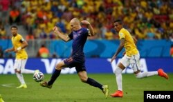 Le Néerlandais Arjen Robben contre le Brésil pour le Mondial 2014.