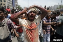 An injured protester is taken to a hospital after a clash with police and Awami League supporters at the Rampura area of Dhaka, Bangladesh, on July 18, 2024.