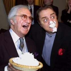 Comedian Soupy Sales with fellow comedian Pat Cooper during a party honoring his 75th birthday at the Friar's Club in New York.