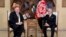 FILE - U.S. Secretary of State Mike Pompeo, left, meets with Abdullah Abdullah the main political rival of President Ashraf Ghani at the Sepidar Palace, in Kabul, Afghanistan, March 23, 2020.