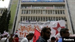 Protesters hold a rally in the courtyard of Greek State broadcaster ERT, Athens, June 13, 2013. 