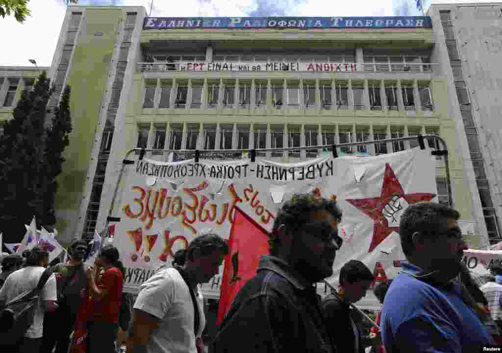 Protesters hold a rally in the courtyard of Greek State broadcaster ERT, Athens, June 13, 2013. 