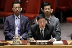 FILE - China's Deputy Permanent Representative Wu Haitao addresses the United Nations Security Council, Aug. 29, 2018, at U.N. headquarters.