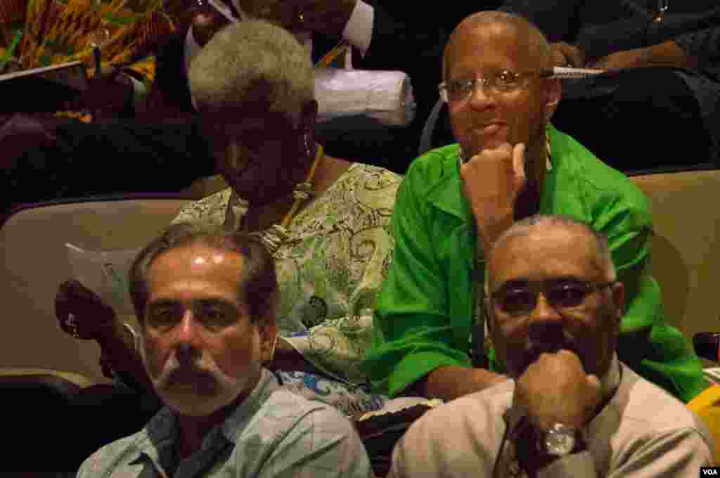 Audience members paying close attention to the panelists. 