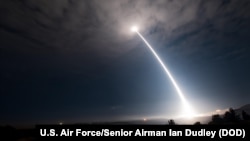FILE - An unarmed Minuteman III intercontinental ballistic missile launches during an operational test at Vandenberg Air Force Base, California, Feb. 26, 2016. 