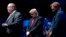 Desde la izquierda, el rabino Benjamin Sendrow acompañado por el presidente Donald Trump y el pastor Thom O'Leary, oran en la Convención y Exposición Agricultores del Futuro en Bankers Life Fieldhouse en Indianapolis, el 27 de octubre de 2018.