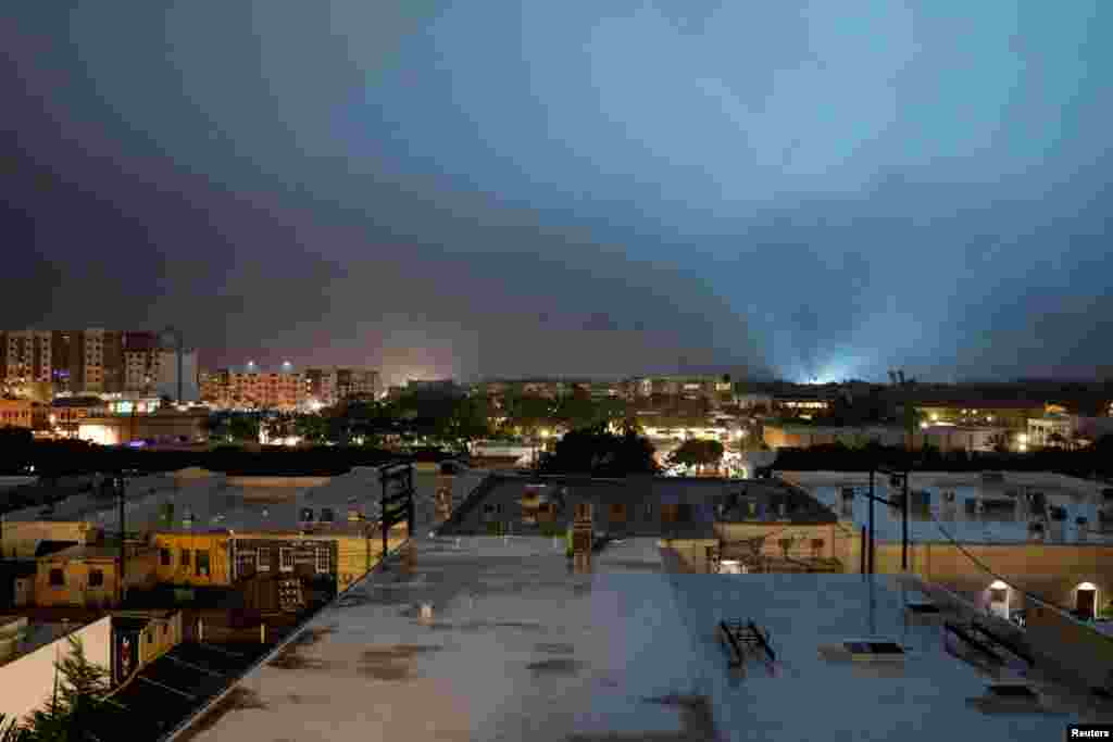 The sky lights up as an electric installation is damaged as Hurricane Milton approaches Sarasota, Florida, Oct. 9, 2024