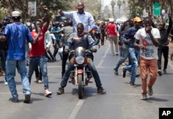 National Super Alliance (NASA) protesters made a dramatic entry into the CBD as they marched to the IEBC - Independent Electoral and Boundaries Commission offices, in Nairobi, Kenya, Oct. 6, 2017.