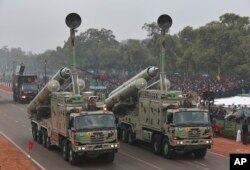 FILE - Indo-Russian supersonic cruise missiles called BrahMos are displayed during the full-dress rehearsal ahead of Republic Day parade in New Delhi, India, Jan. 23, 2015.