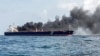 The Singapore-flagged tanker Hafnia Nile burns on July 19, 2024, in Tanjung Sedili, near Singapore. (Malaysian Maritime Enforcement Agency via AFP)