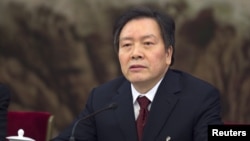 FILE - Communist Party Secretary of Hebei province Zhou Benshun speaks at a session of the National People's Congress (NPC) in Beijing, China, March 7, 2015.