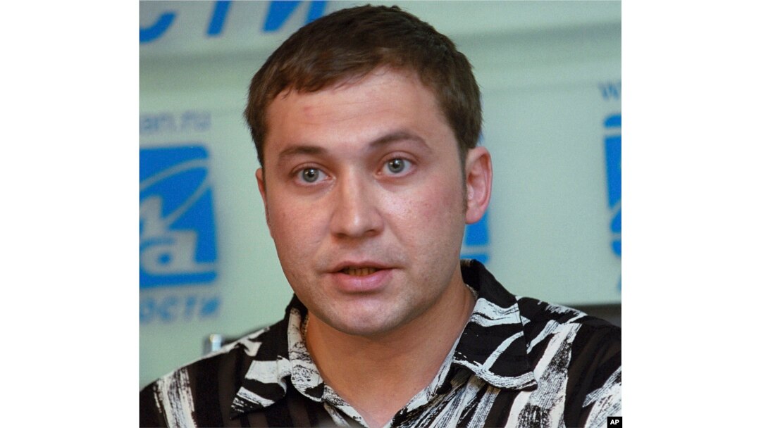 FILE - Russian Airat Vakhitov, a former Guantanamo detainee, speaks at a news conference in Moscow, June 28, 2005.