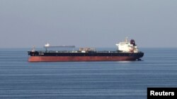 FILE - Oil tankers pass through the Strait of Hormuz, Dec. 21, 2018. 