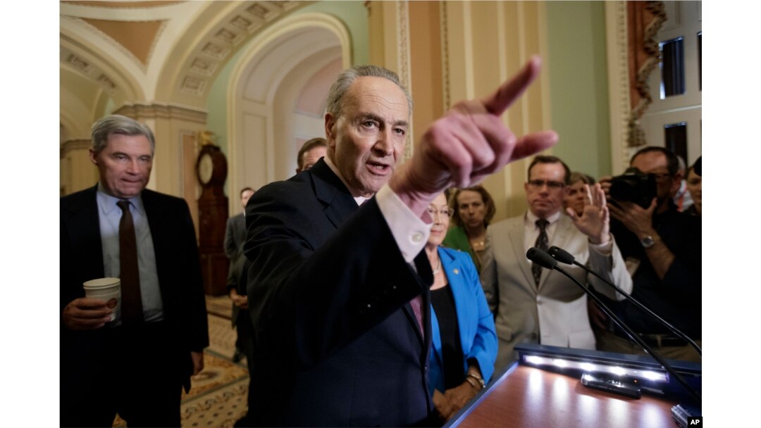 Senate Minority Leader Chuck Schumer of New York, joined by Sen. Sheldon Whitehouse, D-R.I., and Sen. Mazie Hirono, D-Hawaii, speaks to reporters on Capitol Hill in Washington about the struggle to move Supreme Court nominee Neil Gorsuch toward a final up-or-down vote on the Senate floor, April 4, 2017.