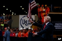President Donald Trump speaks on trade at Granite City Works Steel Coil Warehouse, Granite City, Illinois, July 26, 2018.