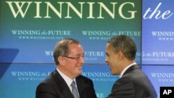 President Barack Obama is greeted by Intel CEO Paul Otellini after touring an Intel facility in Hillsboro, Ore., February 18, 2011