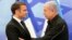 FILE - Israeli Prime Minister Benjamin Netanyahu (R) shakes hands with French President Emmanuel Macron (L) after their joint press conference in Jerusalem on October 24, 2023.