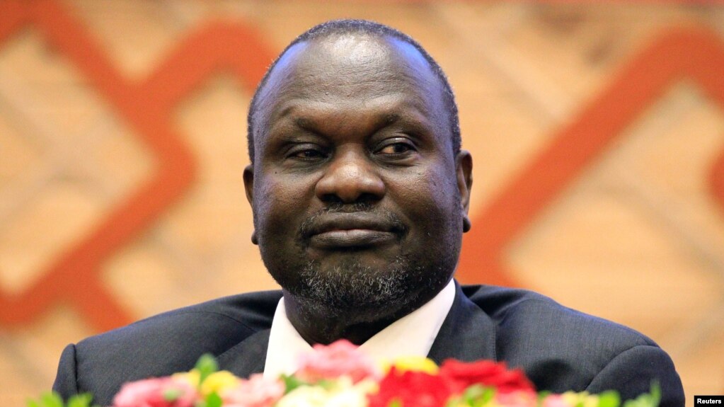 South Sudan rebel leader Riek Machar attends the signing of a peace agreement with the South Sudan government in Khartoum, Sudan, June 27, 2018
