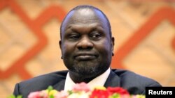 Riek Machar assiste à la signature d'un accord de paix avec le gouvernement du Sud-Soudan à Khartoum, au Soudan, le 27 juin 2018