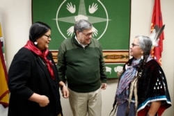 Attorney General William Barr, center, speaks with Myrna DuMontier, left, and Charmel Gillin, councilwomen with the Confederated Salish and Kootenai Tribes, after a roundtable meeting on missing and murdered indigenous persons, Friday, Nov. 22, 2019…