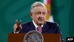 Mexican President Andres Manuel Lopez Obrador speaks during his daily press conference at the Palacio Nacional, in Mexico City, on Feb. 8, 2021. 