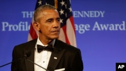 Former President Barack Obama addresses an audience after being presented with the 2017 Profile in Courage award during ceremonies at the John F. Kennedy Presidential Library and Museum, May 7, 2017.