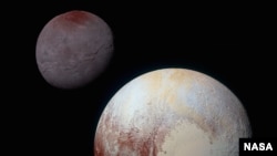 FILE - This composite of enhanced color images shows Pluto (lower right) and Charon (upper left), taken by NASA’s New Horizons spacecraft as it passed through the Pluto system on July 14, 2015.