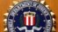FILE - The Federal Bureau of Investigation of the Department of Justice of the United States of America emblem at the U.S. embassy in Berlin, Aug. 10, 2007.