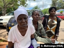 Kasirina Zibveka, 69, accompanied her daughter Margret Chikoti, center, has not been able to have her ailing lung removed since mid-December. Now her chances have begun to look up.