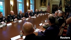 U.S. President Donald Trump participates in a briefing with senior military leaders at the White House in Washington, Oct. 5, 2017.