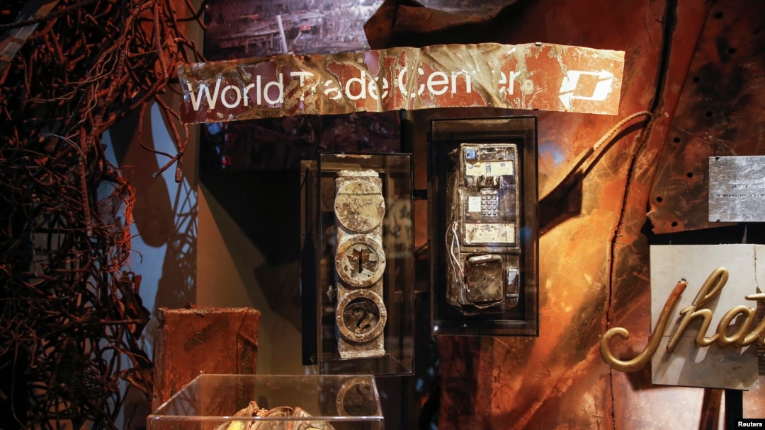 FILE - Artifacts are seen inside the National September 11 Memorial & Museum in New York May 14, 2014.