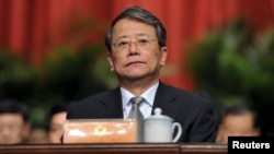 FILE - Ling Zhengce, deputy chairman of the Shanxi branch of the Chinese People's Political Consultative Conference (CPPCC), attends a meeting in Taiyuan, Shanxi province, China, Jan. 22, 2013.