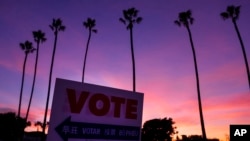 FILE - A sign directs the way to a polling place at Marina Park Community Center in Newport Beach, California, Nov. 5, 2024.