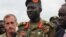 FILE - Brigadier General Lul Ruai Koang of the Sudan People's Liberation Army (SPLA) addresses the media in Juba, Aug. 29, 2017. 