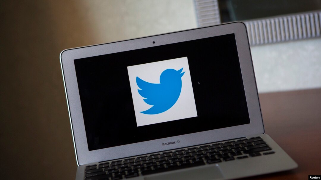 The Twitter logo as seen on a laptop computer.