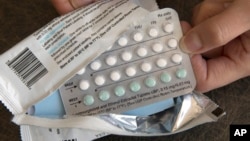 FILE - A one-month supply of birth control pills is displayed in Sacramento, Calif., Aug. 26, 2016. A U.S. appeals court Dec. 13, 2018, blocked rules by the Trump administration allowing more employers to opt out of providing women with no-cost birth contreol.