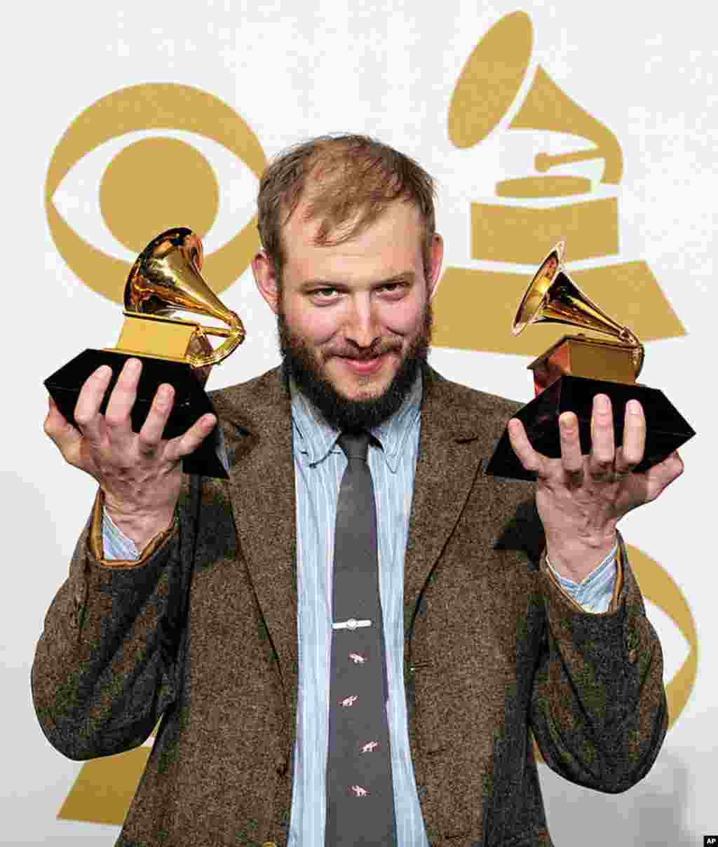 Justin Vernon poses backstage with the award for best alternative music album for "Bon Iver" at the 54th annual Grammy Awards in Los Angeles, February 12, 2012. (AP Photo/Mark J. Terrill)