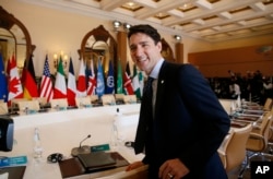 Canadian Prime Minister Justin Trudeau waits for the start of a round table meeting of G7 leaders and Outreach partners at the Hotel San Domenico during a G7 summit in Taormina, Italy, May 27, 2017.