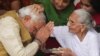 90-year-old Hiraben blesses her son and India's next prime minister Narendra Modi at her home in Gandhinagar, in the western Indian state of Gujarat, May 16, 2014. 