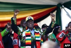 Zimbabwe's President Emmerson Mnangagwa addresses a rally in Bulawayo on June 23, 2018.